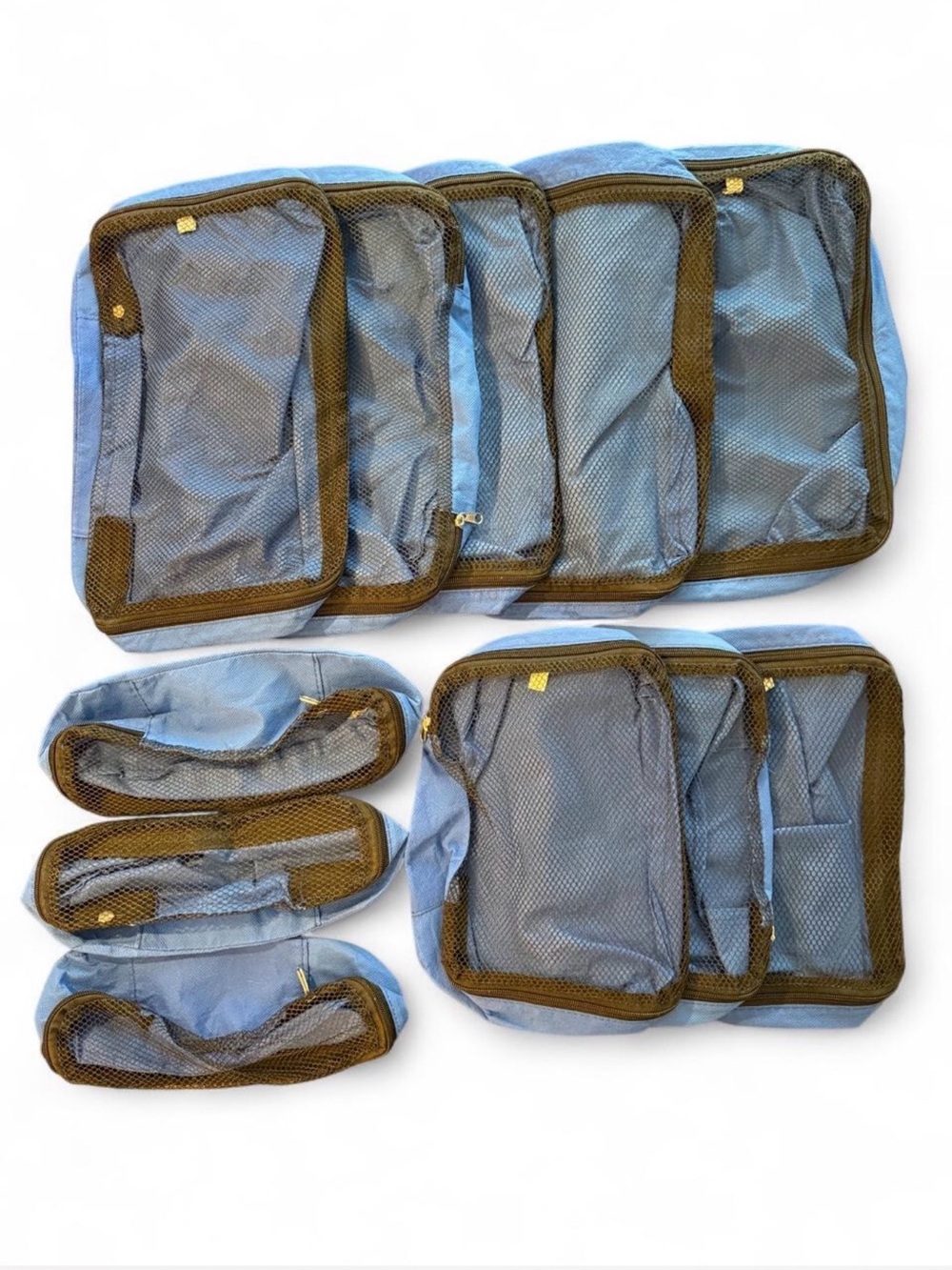Packing cubes set of 11 in various sizes. Royal blue and black.